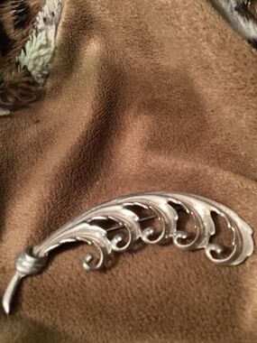 Sterling leaf brooch nice weight intricate design signed sterling